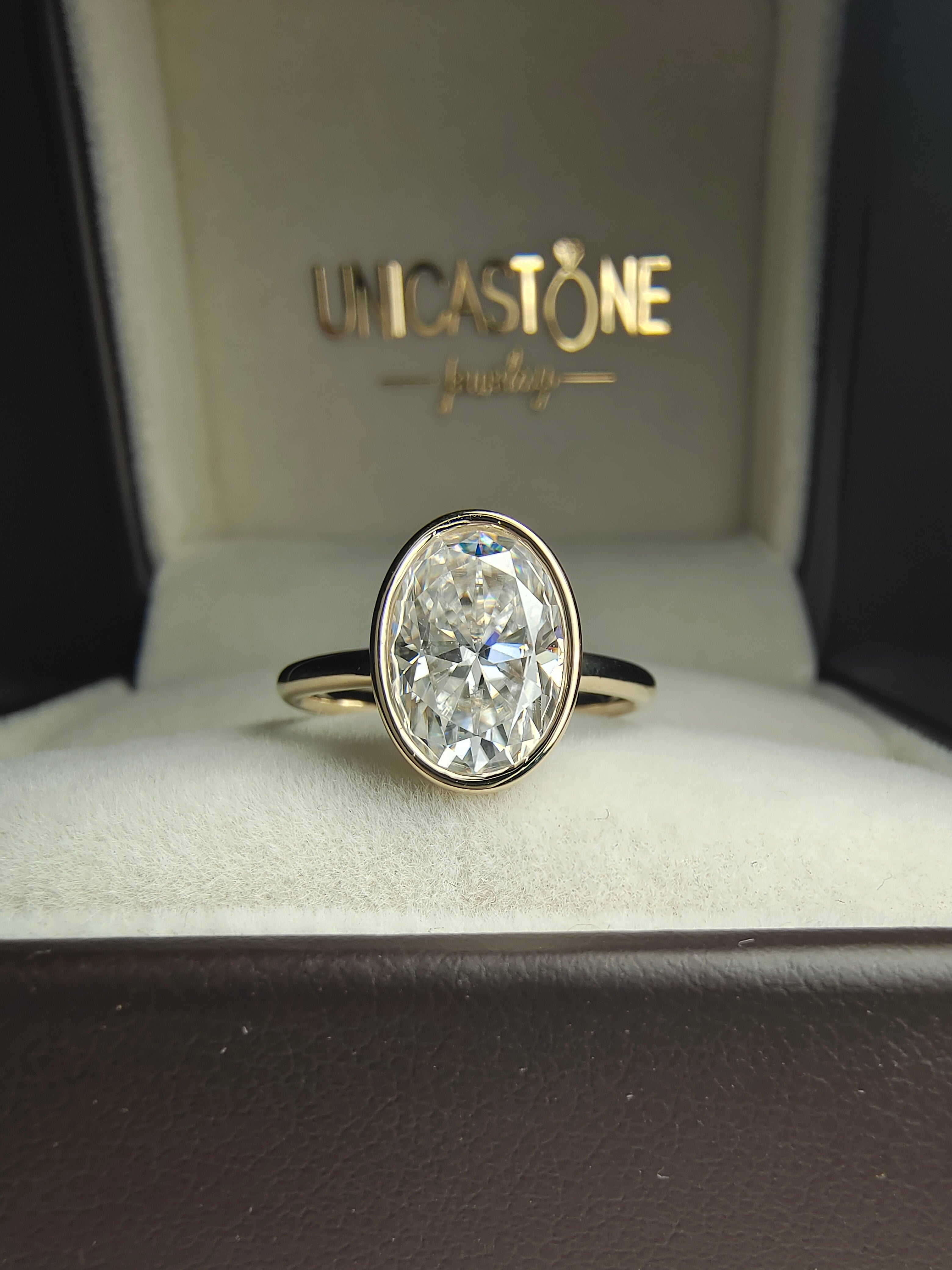 Bezel Set Oval Engagement Ring by UnicaStone