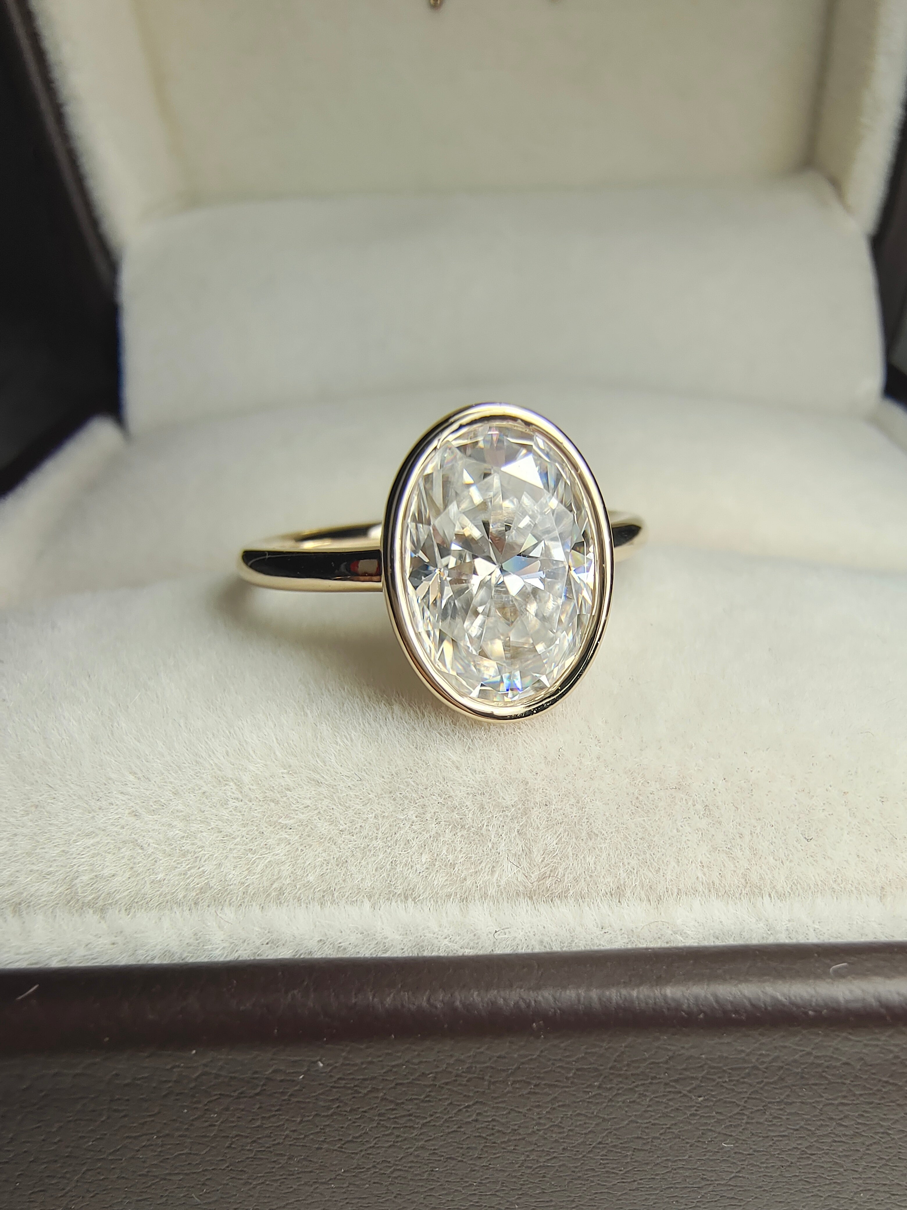 Bezel Set Oval Diamond Engagement Ring by UnicaStone