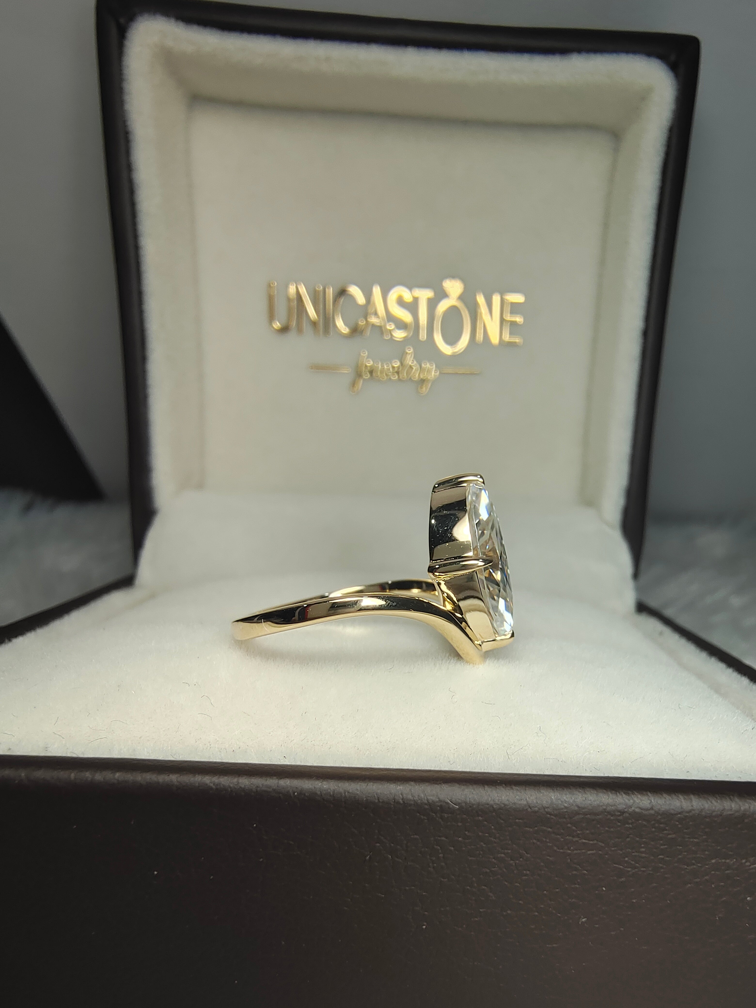 Modern Engagement Ring with Marquise Cut Moissanite by UnicaStone