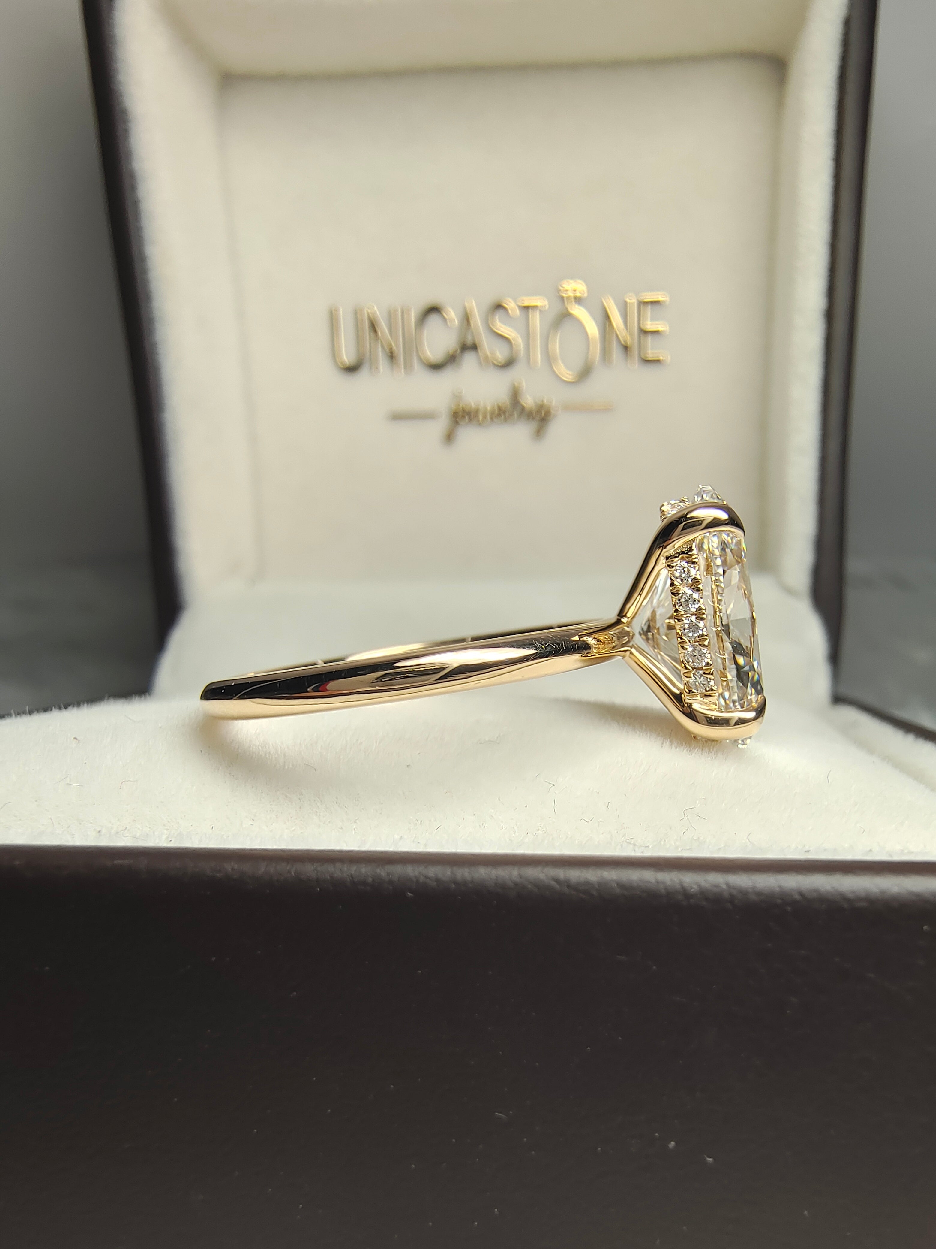 Oval Cut Hidden Halo Solitaire Ring by UnicaStone