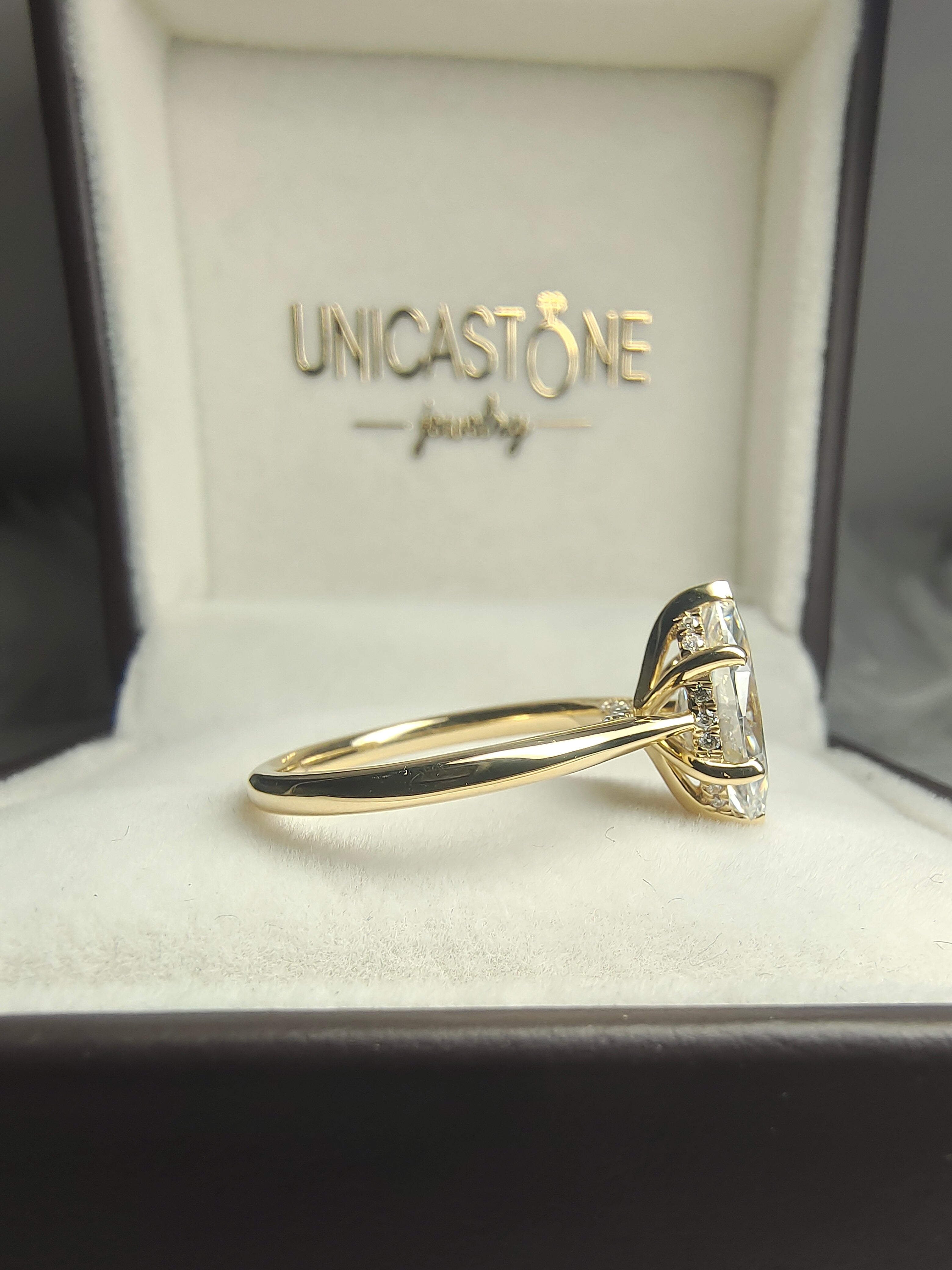 Cathedral Setting Marquise Engagement Ring by UnicaStone
