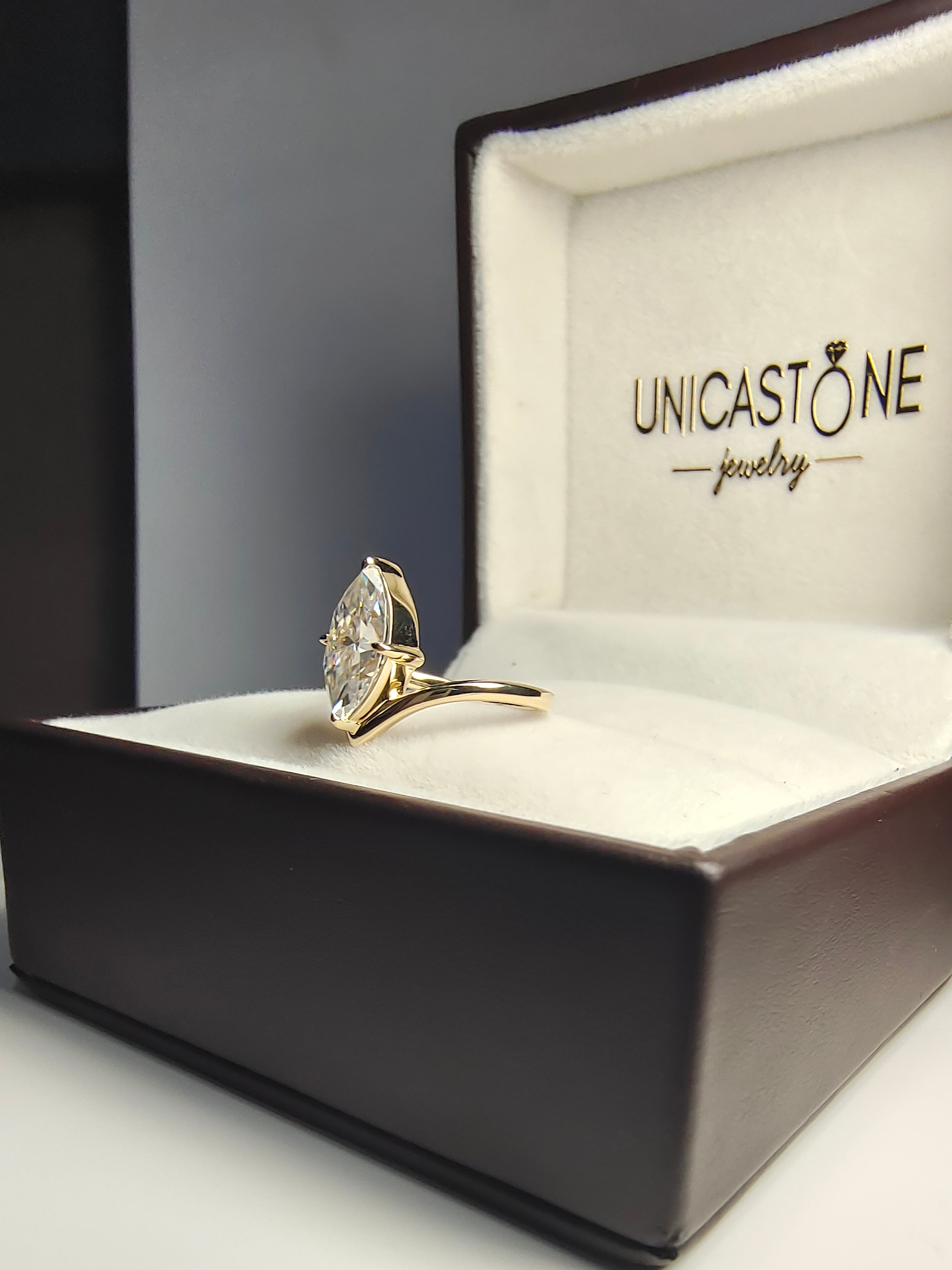 Stunning marquise Cut Moissanite Engagement Ring Featuring a Sleek Chevron Band