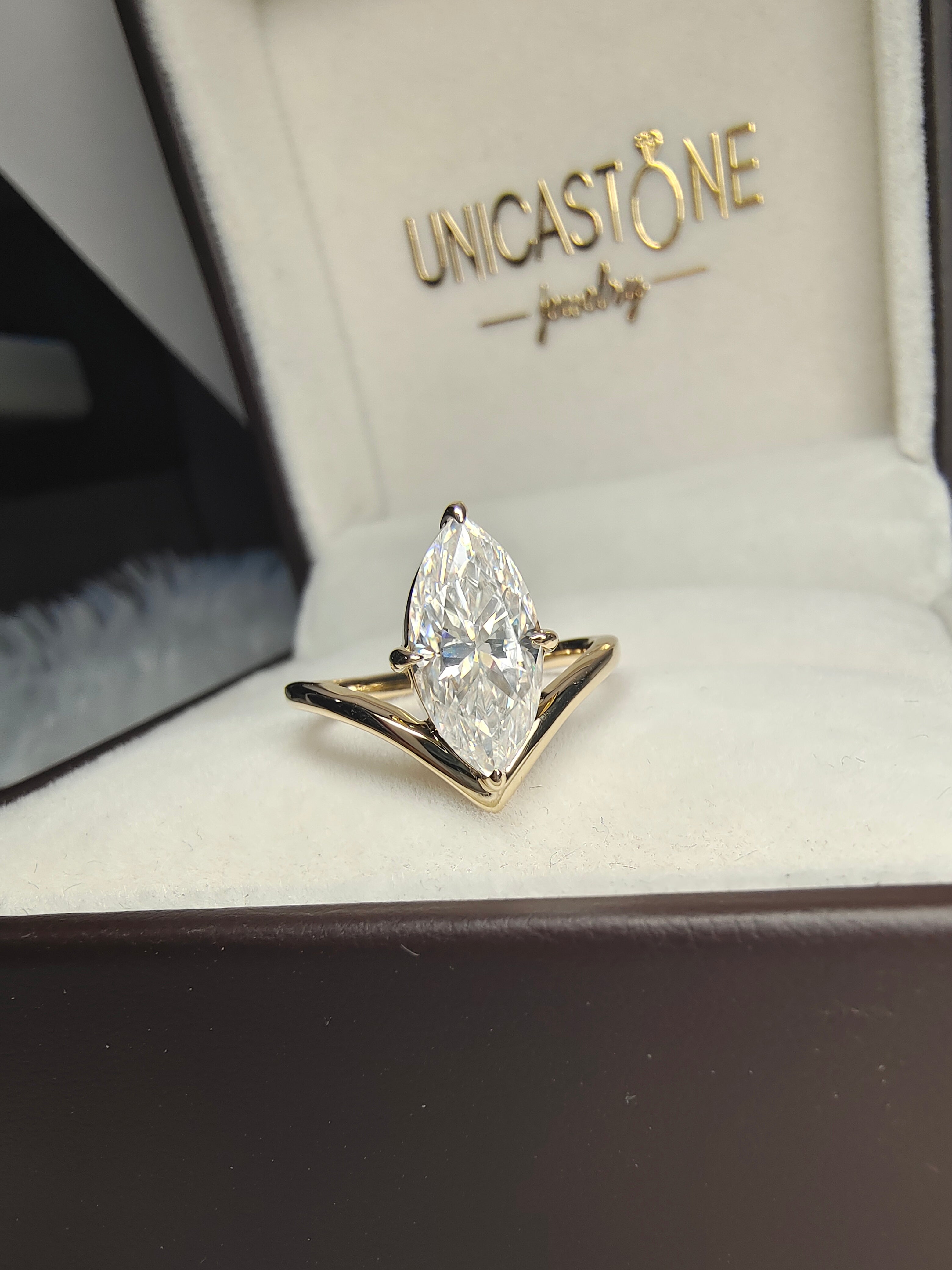 Brilliant Marquise Moissanite Ring with Chevron Band by UnicaStone