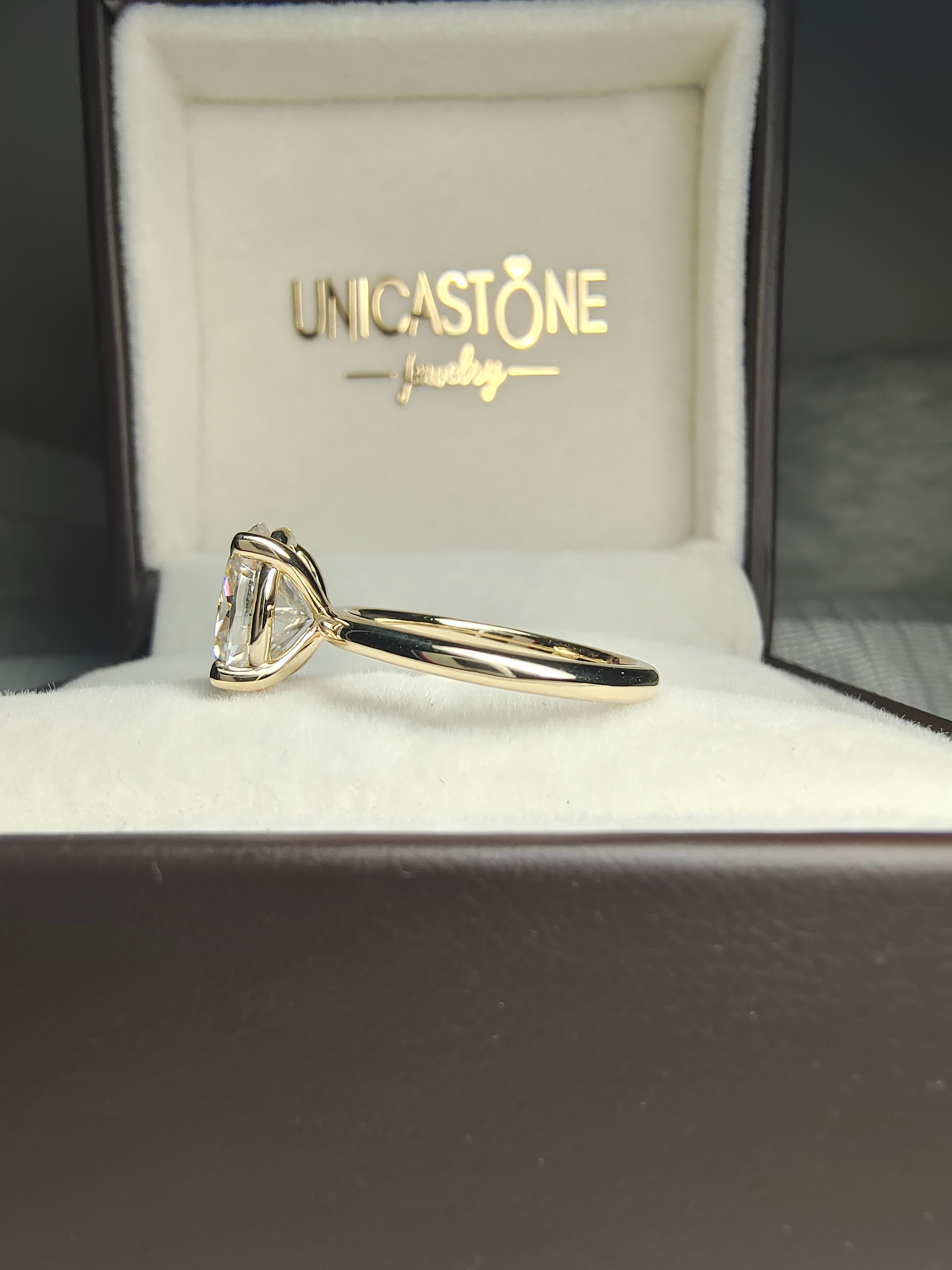 Elegant Oval Cut Solitaire Engagement Ring by UnicaStone
