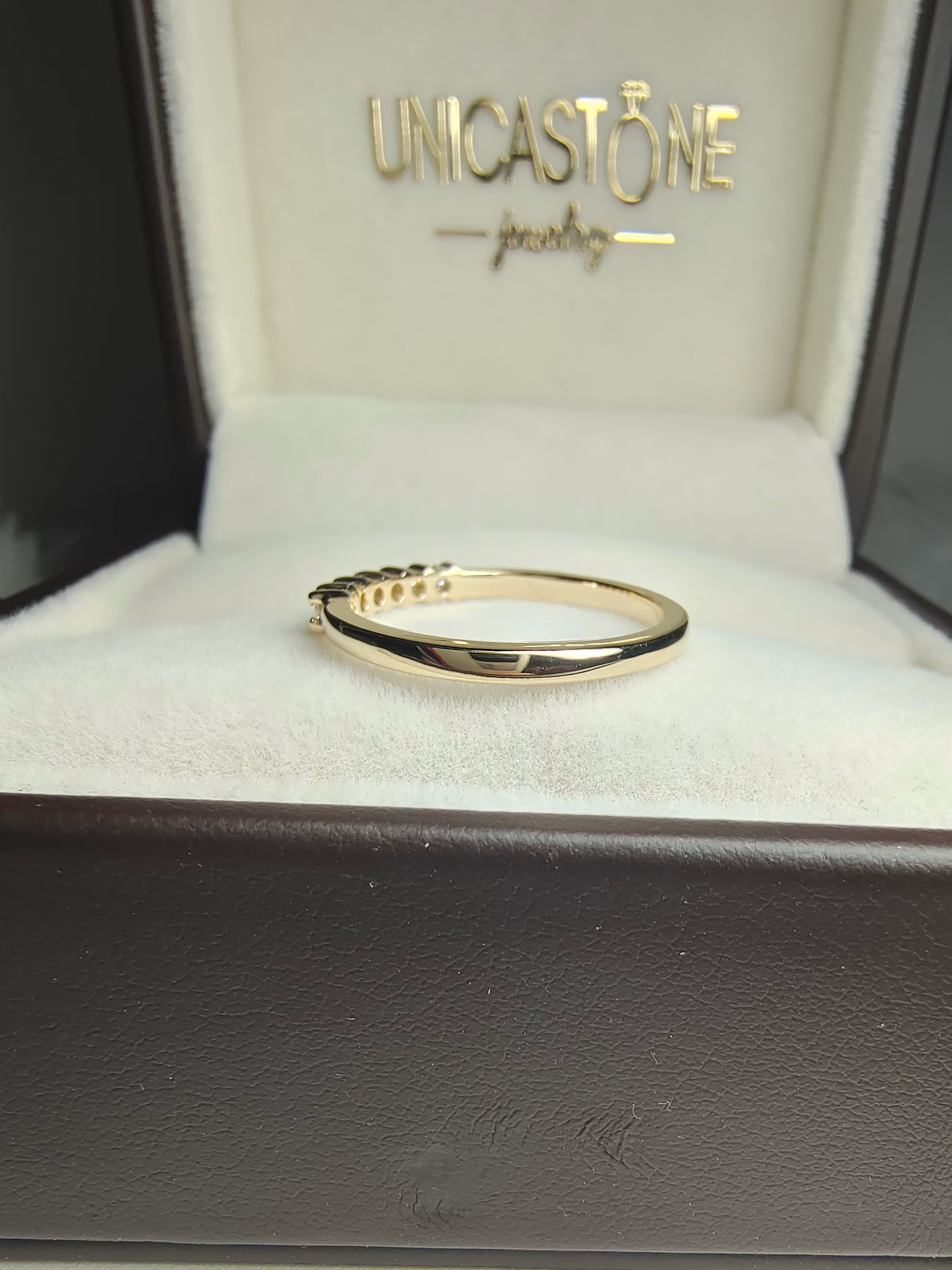 Six Stone Moissanite Wedding Band by UnicaStone