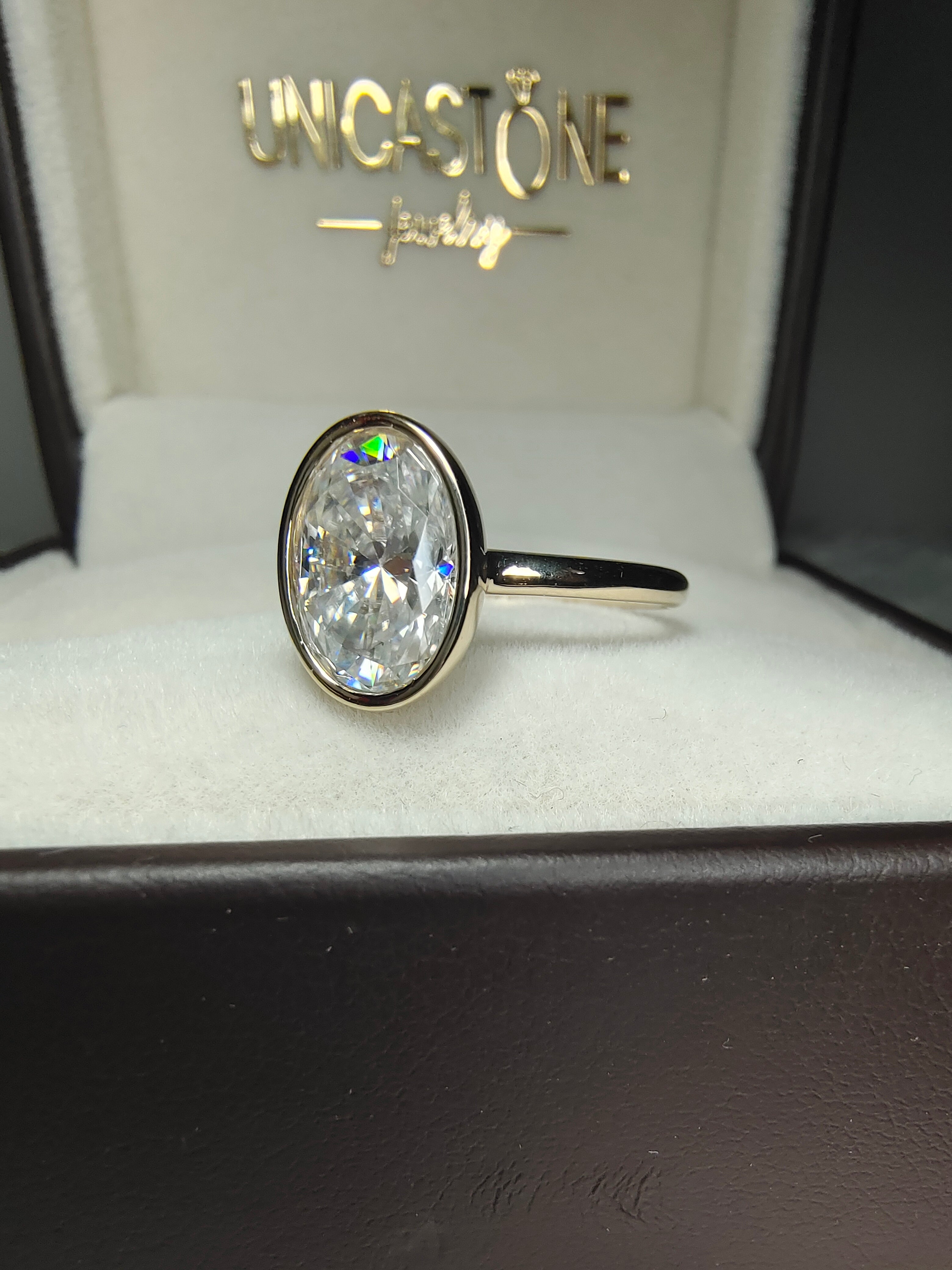 Oval Moissanite Proposal Ring by UnicaStone