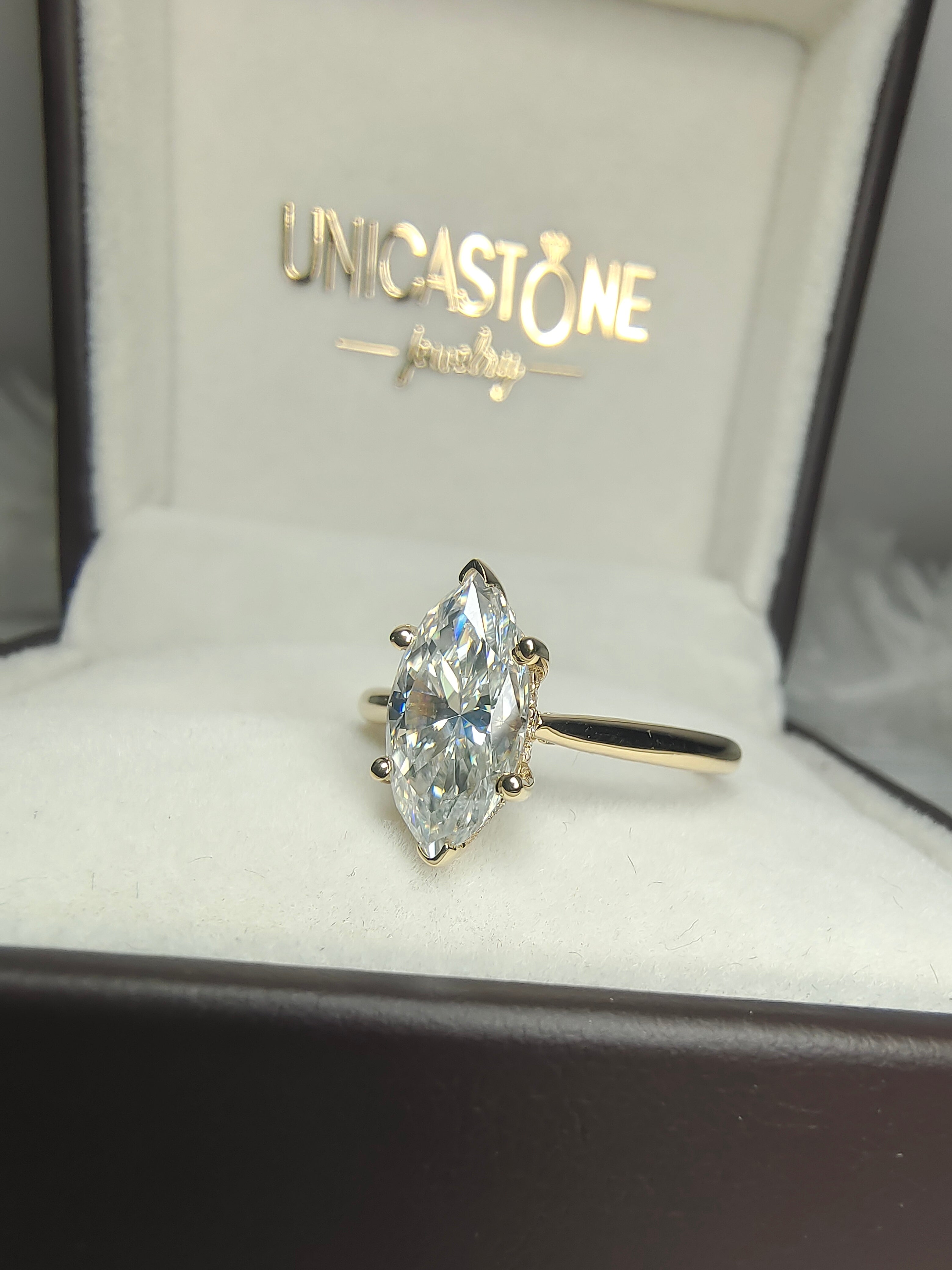 Marquise Hidden Halo Engagement Ring by UnicaStone