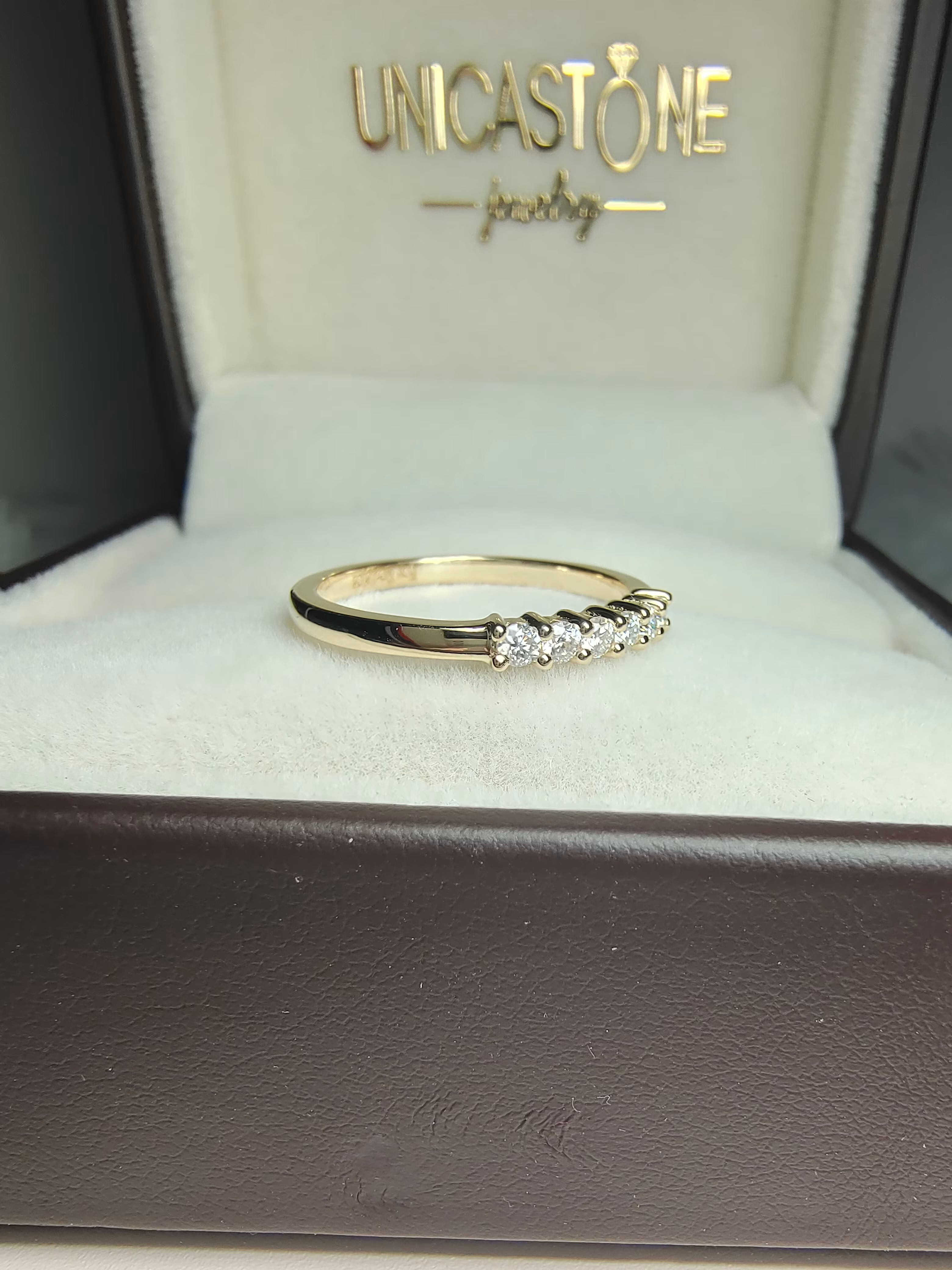 Six Stone Round Cut Moissanite Ring by Unicatone