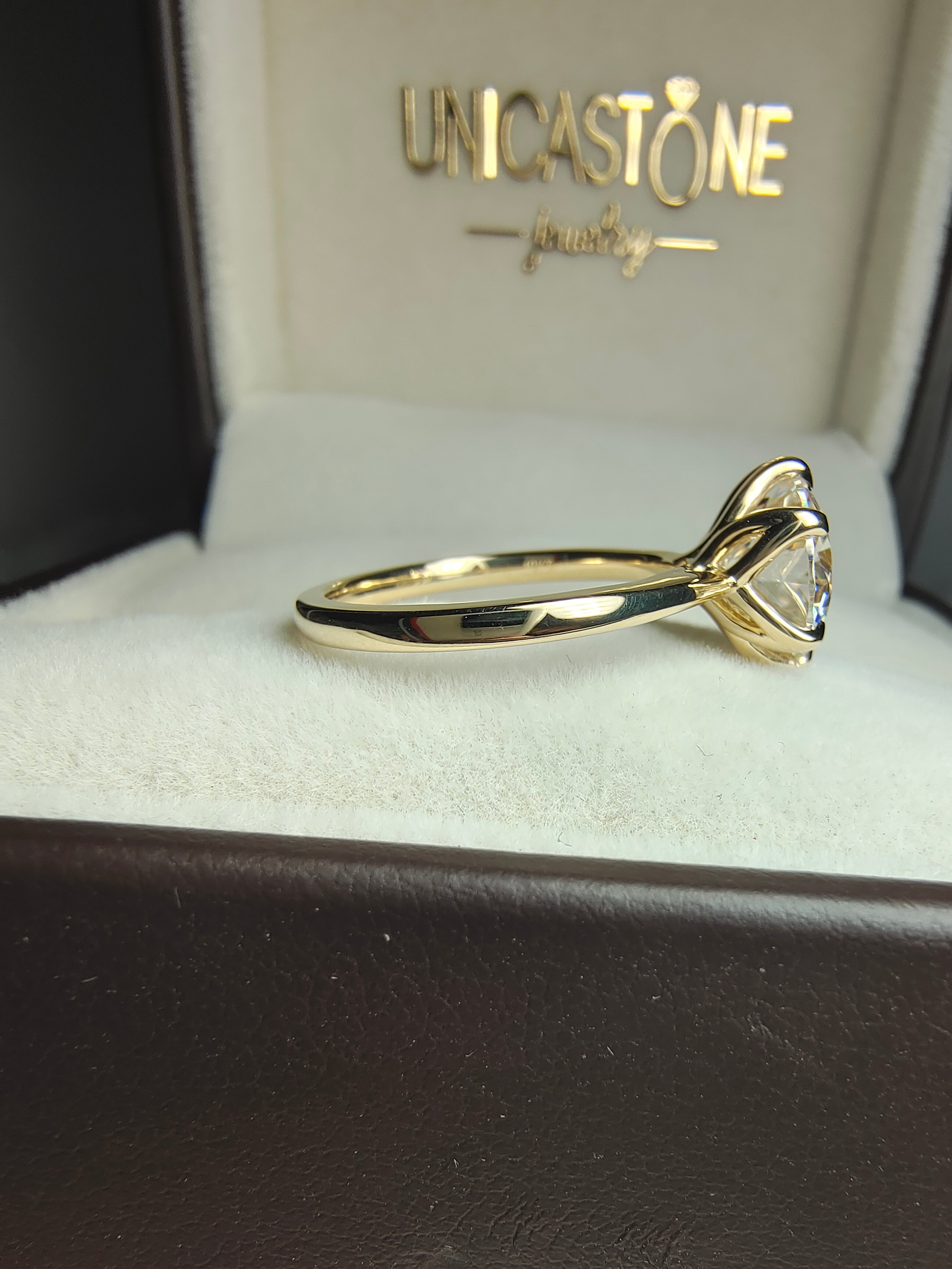 Tulip Set Engagement Ring by UnicaStone