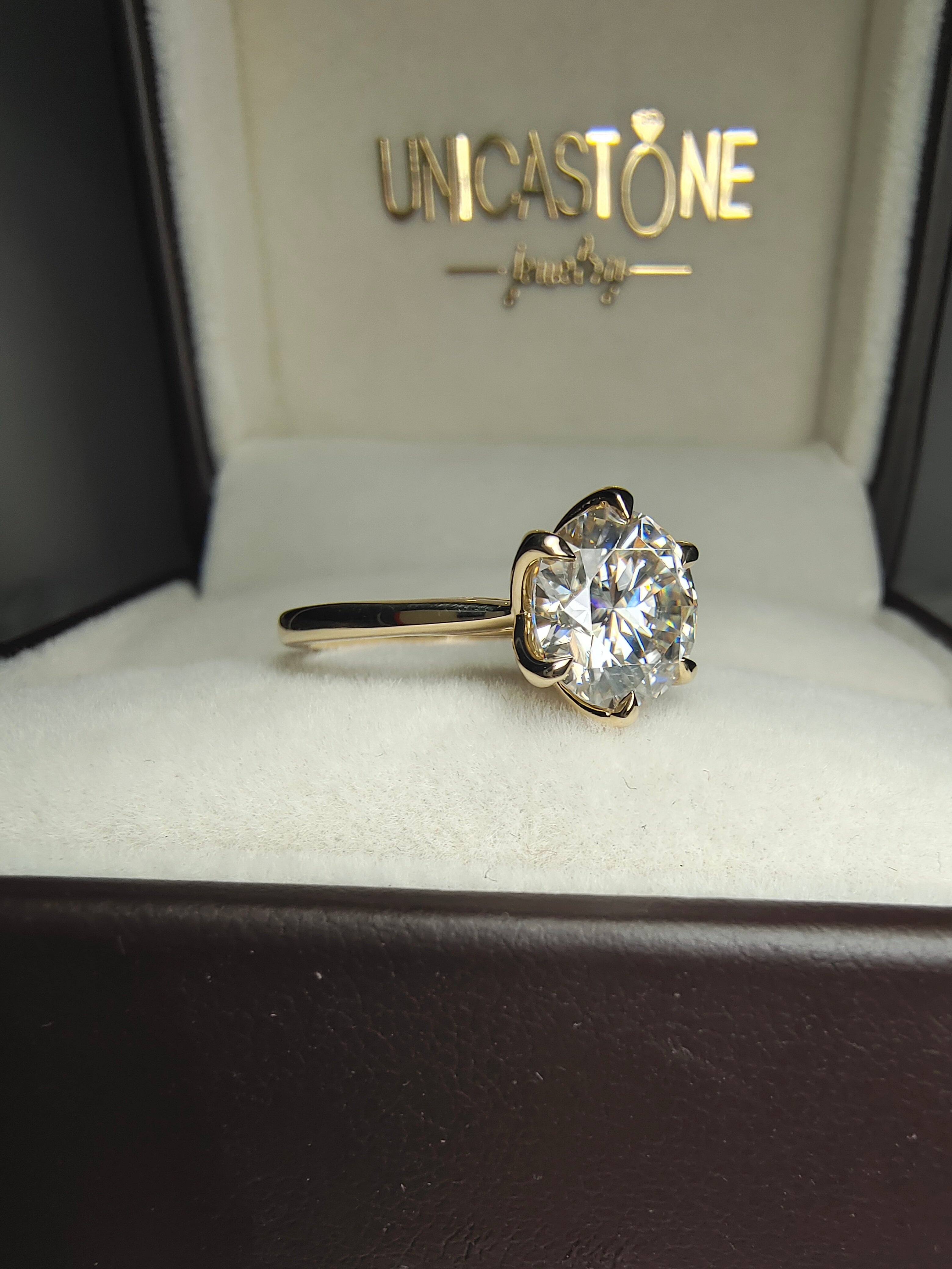 Tulip Setting Round Solitaire Ring by UnicaStone
