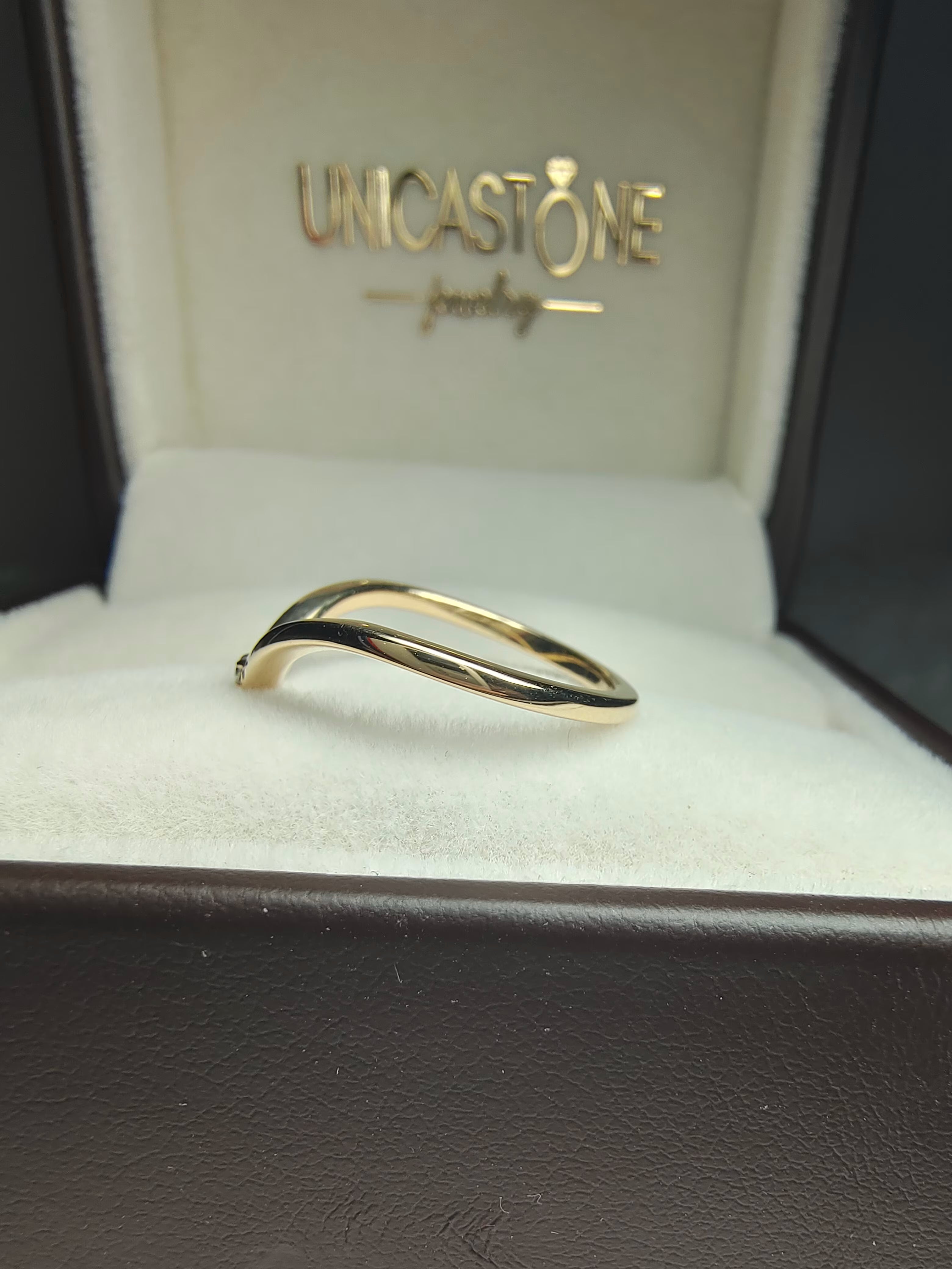 v shape nesting moissanite wedding band by unicastone